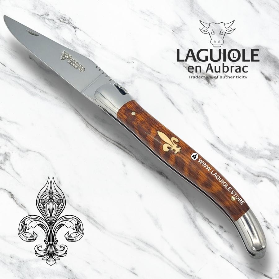 laguiole knife with ivory marquetry 'fleur de lys' in snakewood handle